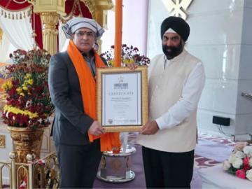 Surender S. Kandhari, Chairman - Guru Nanak Darbar Sikh Temple, Dubai, UAE gets felicitated by World Book of Records - London